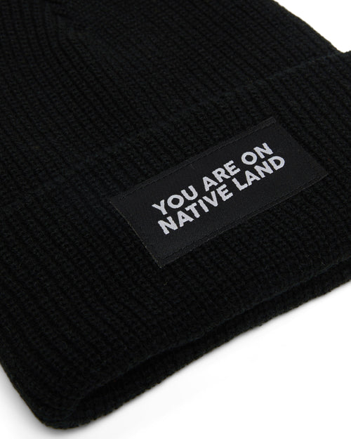 'YOU ARE ON NATIVE LAND' RIBBED BEANIE